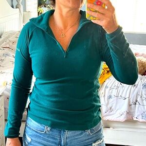 Columbia quarter zip, teal blue fuzzy pullover. Size small. Great condition.